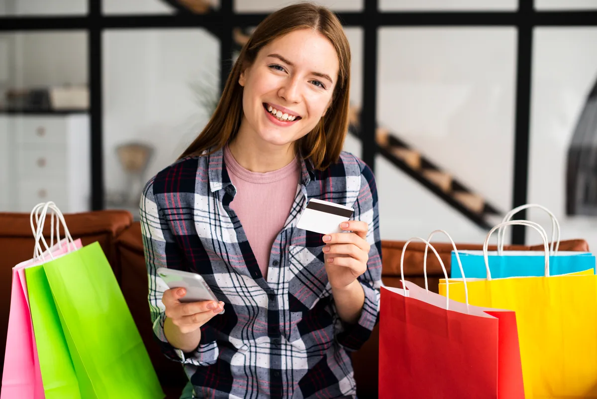 Proof point angle: a vertical cut of a shopper holding a card and a phone, captioned